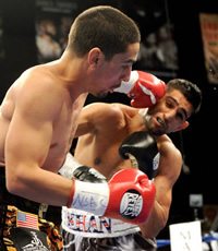 Amir Khan loses title to Garcia