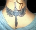 Nape tattoo on female