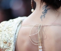 indian lady with tattoo on nape of neck