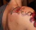 indian lady with an upper shoulder tattoo