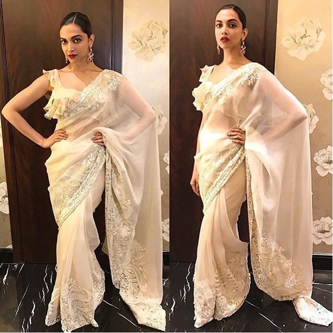 Deepika wearing a white saree
