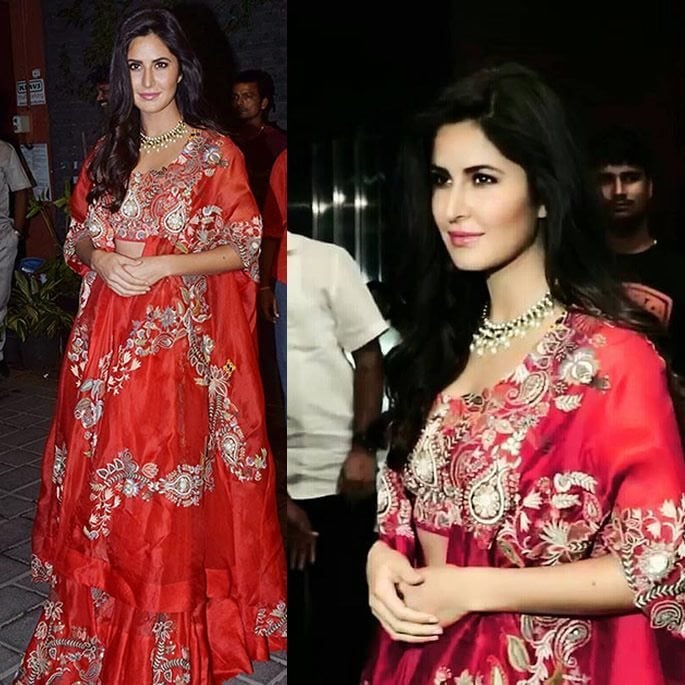 Katrina wears a red, patterned lehenga.