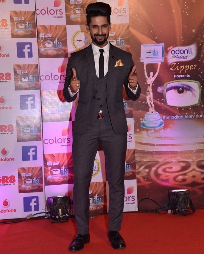 Ravi Dubey posing on red carpet