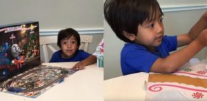 Ryan looking at toys