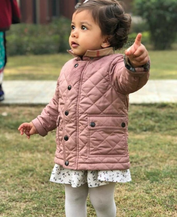 Misha pointing with her finger