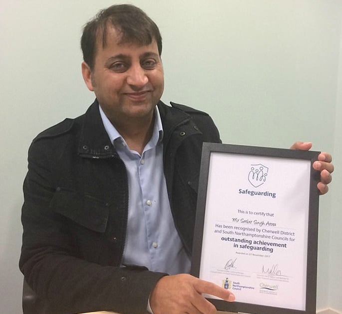 Satbir with certificate