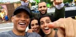Main cast of Aladdin posing for a selfie