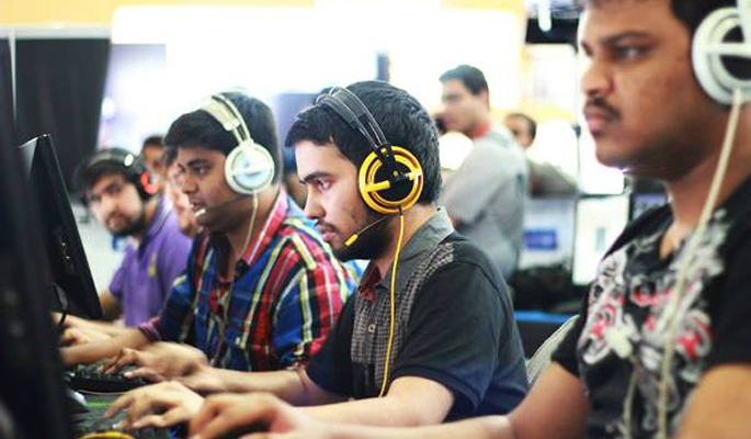 Indian men competing in a esports competition