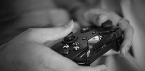 Gamer playing with controller