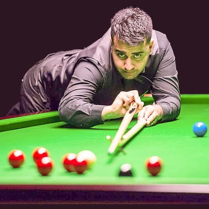 Farakh Ajaib: Snooker player with Natural Flair & Fluidity - game cue