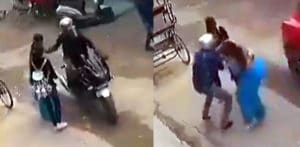 Indian Woman stops Thief on Motorbike Stealing her Chain f