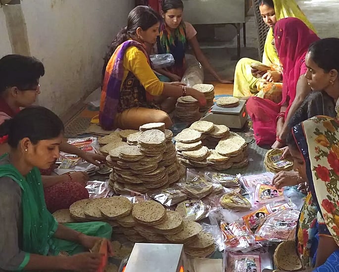 The Origins and History of the Popular Poppadom - women