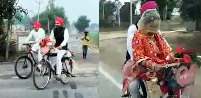 Indian Groom Picks Up His Bride on his Bicycle