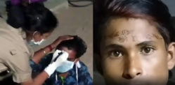 Indian Policewoman writes 'Stay Away' on Worker's Forehead