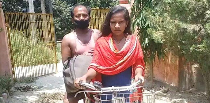 Indian Girl cycles 1,200km while Carrying injured Father f