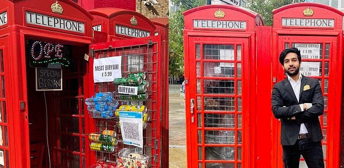 Man opens 'World's Smallest Takeaway' from red Phone Box f