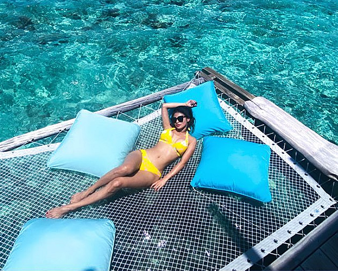 Bollywood Stars in Bikinis on the Beaches of Maldives - mouni roy yellow