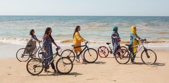Pakistani Fashion campaign featuring women on Cycle - f