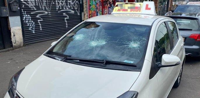 Driving Instructor has Windscreen Smashed in Racist Attack f