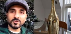 Vir Das hides bottle of Gold Champagne in London f