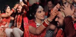 Indian Bride puts Sindoor on Husband's Head in Wedding