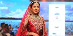 Shehnaaz Gill stuns in Red Bridal Lehenga for Catwalk Debut