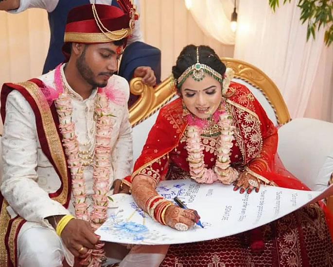 Indian Couple sign '1 Pizza a Month' Marriage Contract