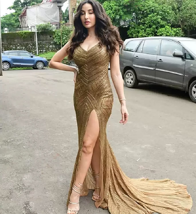 Nora Fatehi shimmers in Figure-Hugging Gold Gown 3