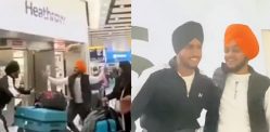 Man welcomes Friend at Heathrow Airport with Bhangra