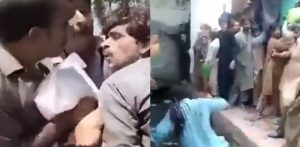 Pakistani Men fight whilst Waiting for Chapati Flour f