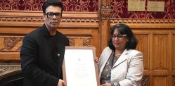Why was Karan Johar honoured by UK Parliament f