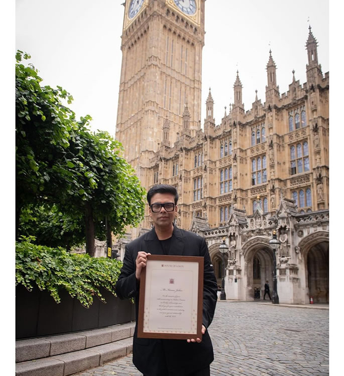 Why was Karan Johar honoured by UK Parliament