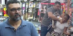 Shopkeeper caught 'Strangling' suspected Shoplifter f