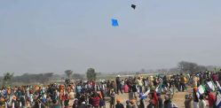 Indian Farmers take on Police with Kites during Protests f