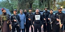 Amir Khan shocks Fans by Posing with Armed ‘Squad’