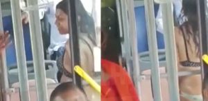 Donna indiana a bordo di un autobus affollato in biancheria intima f