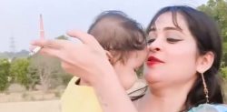 Indian Woman slammed for Smoking while Holding Child